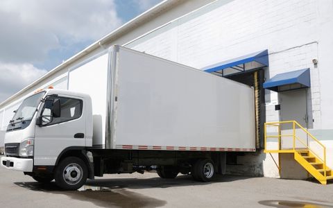 Delivery truck at a warehouse loading dock